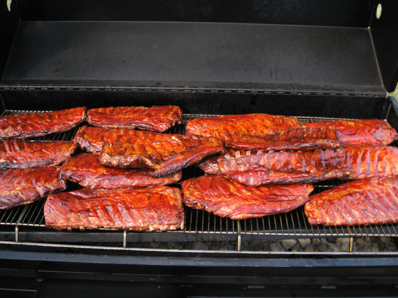 Pork Ribs on a Meadow Creek Pig Roaster and Meadow Creek BBQ42 Chicken Cooker Trailer