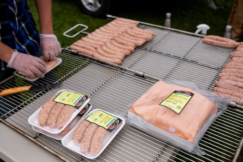 Sausages on Meadow Creek BBQ42 Chicken Smoker Grate