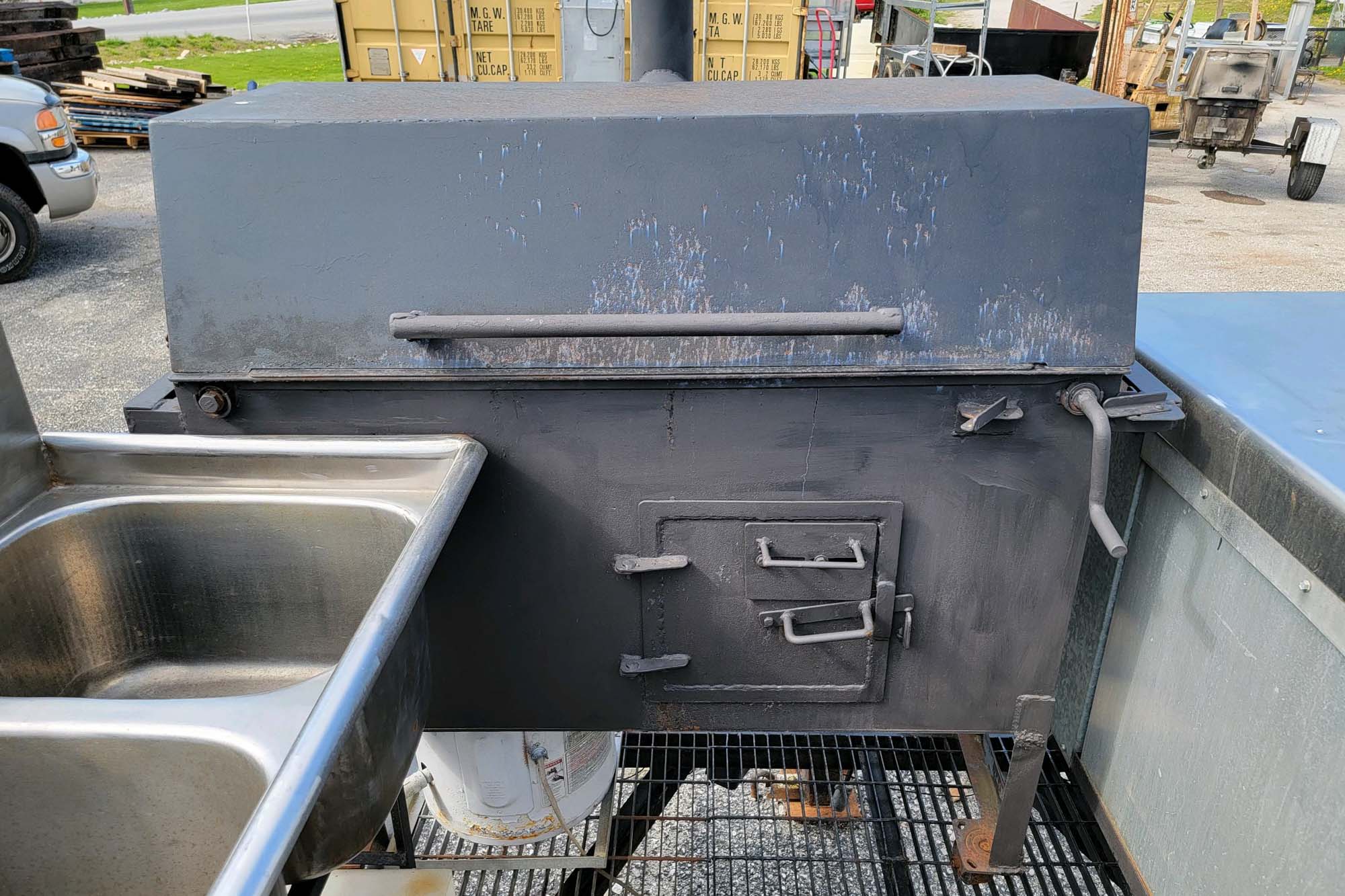 20' Double-Axle Trailer With 6' x 3' Smoker, a 2' x 3' Smoker, Stainless Steel Table, and 3-Bowl Sink