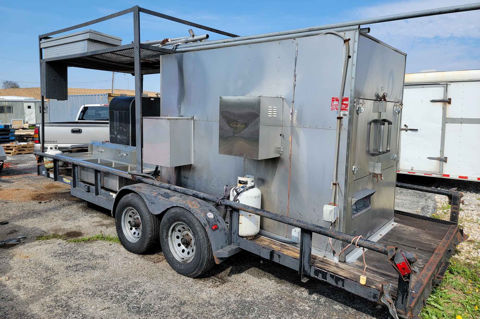 20' Double-Axle Trailer with SPK 1400 Southern Pride, Old Hickory Smoker 100, 3-Bowl Sink, and Tent Parts